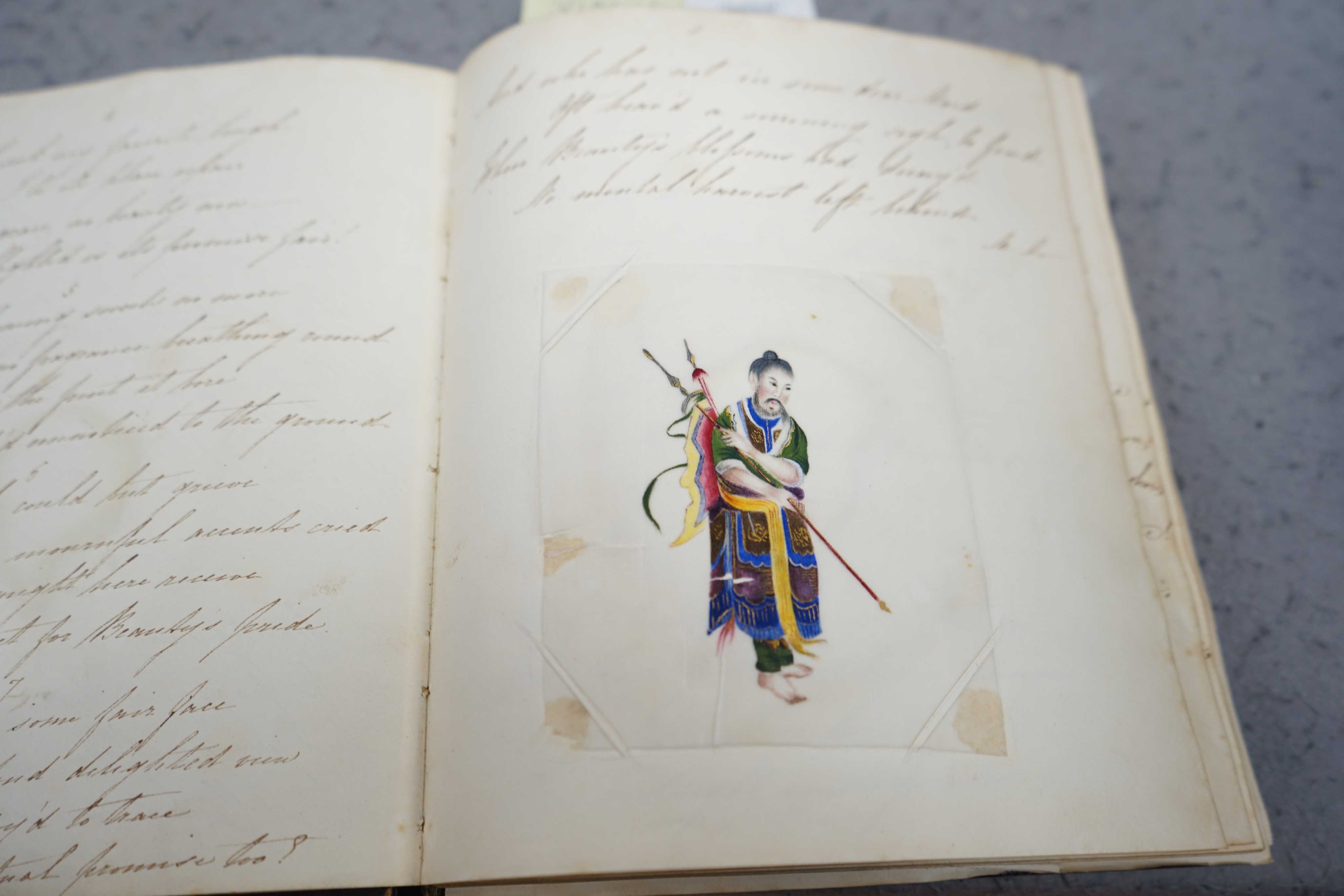 An early 19th century hand written journal, sketch book with scraps, coloured engravings, etc.